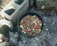 Meat browned, veggies added